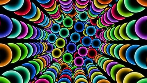 Colored balls in formation rotate in a seamless loop. Stock Footage 291976211