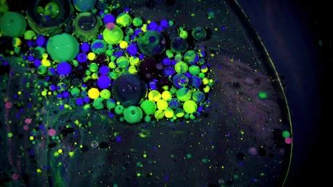 Colored balls lie on a flat surface Stock Photos