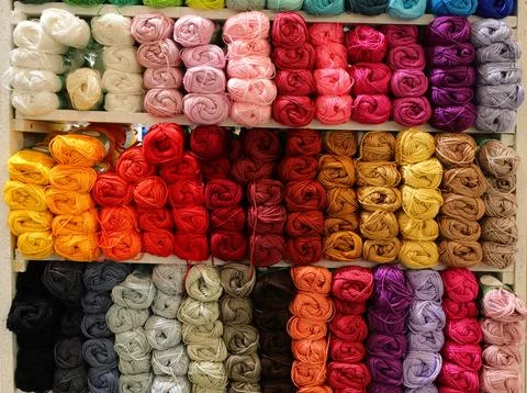 Colored Balls of wool or cotton fabric for sale Stock Photos