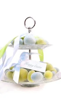 Colored beaded easter eggs on white 写真素材
