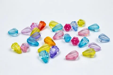 Colored beads for design on a white background 库存照片