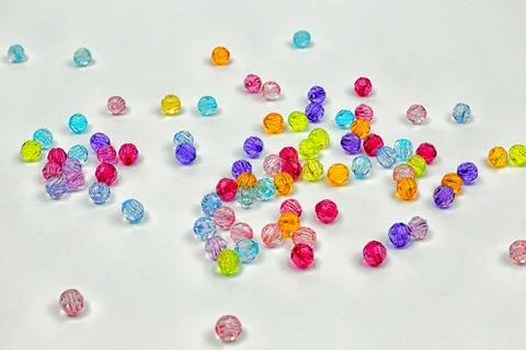 Colored beads for design on a white background Foto stock