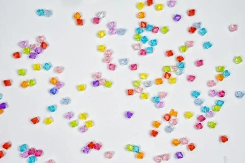 Colored beads for design on a white background Stock Photos