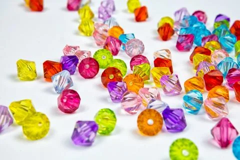 Colored beads for design on a white background Stock Photos