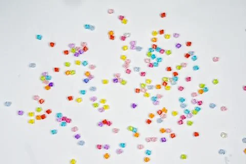 Colored beads for design on a white background Stock Photos