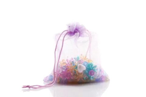 Colored beads in a lavender bag Stock Photos