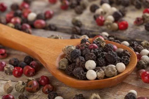 Colored black pepper Stock Photos