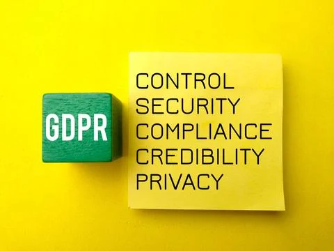 Colored block and sticky note with the word GDPR Stock Photos