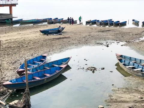 Colored boats on the beach Stock Photos