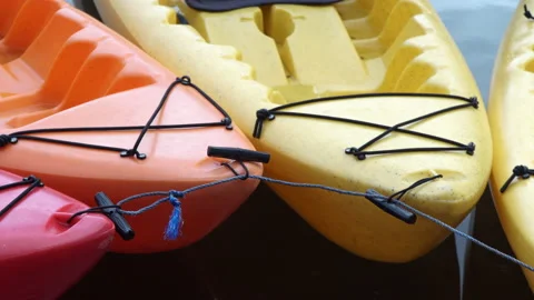 Colored boats connected to each other near from the shore. Stock Footage 139398539