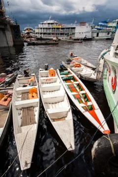 Colored boats in Manaus harbor - Amazon Stock Photos