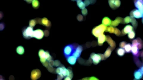 Colored Bokeh Motion Particles Moving on Black Abstract Background Stock Footage 75607781