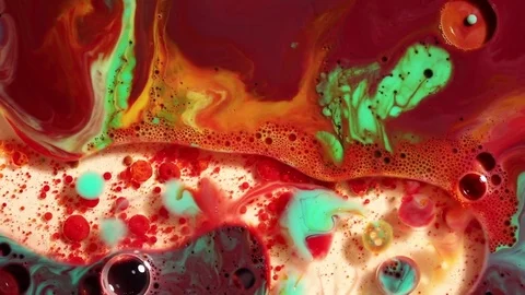 Colored bubbles of paint on the oil surface Stock Footage 80855867