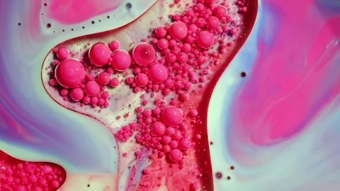 Colored bubbles of paint on the oil surface Stock Footage 80855981