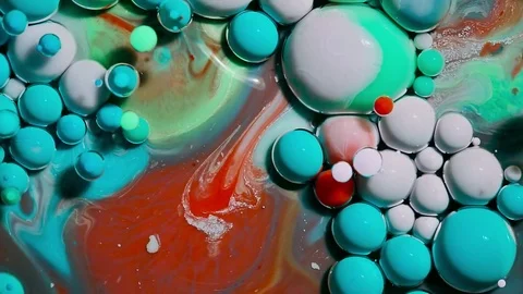 Colored bubbles of paint on the oil surface Stock Footage 81017276