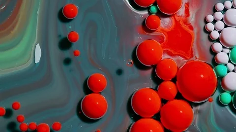 Colored bubbles of paint on the oil surface Stock Footage 81017307