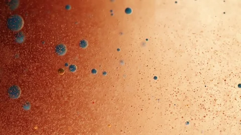 Colored bubbles of paint on the oil surface Stock Footage 81146615