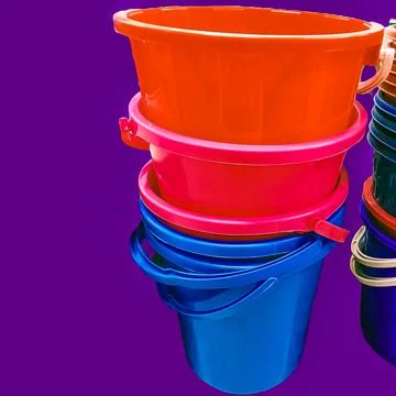 Colored buckets Stock Photos