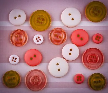 Colored buttons of different sizes on the surface Stock Photos