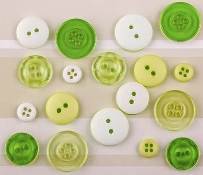 Colored buttons of different sizes on the surface Stock Photos