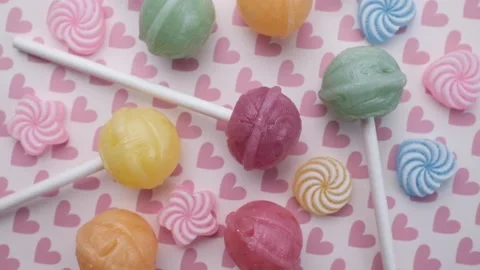 Colored  candies,  mix of sweets and lollipops rotating. Stock Footage 235656036