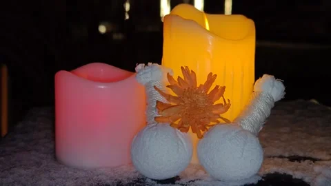 Colored candles composition flickering in the dark Видео 325051070