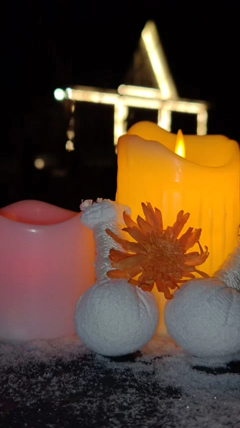Colored candles composition flickering in the dark lights on the background macr Stock-Footage 325051075