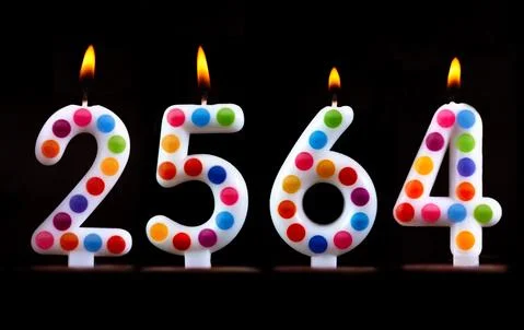 Colored candles write numbers flame Thailand Songkran new year 2564 스톡 사진