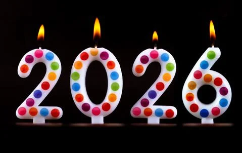 Colored candles write numbers flame Happy new year 2026 Stock Photos