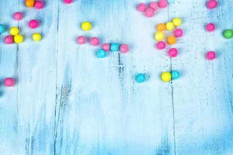Colored candy in the wooden table Stock Photos