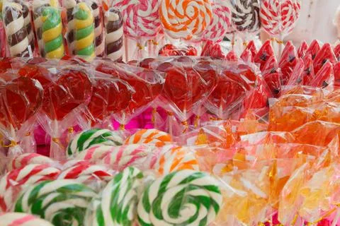 Colored caramel on a stick Stock Photos