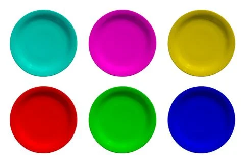 Colored ceramic round plates isolated on white background Фото