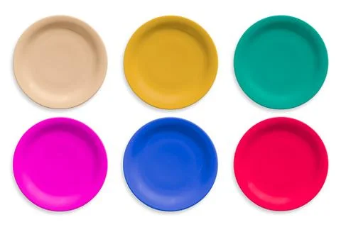 Colored ceramic round plates isolated on white background Stock Photos