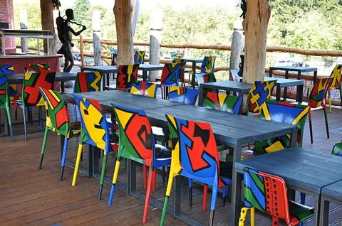 Colored chairs and table Stock Photos