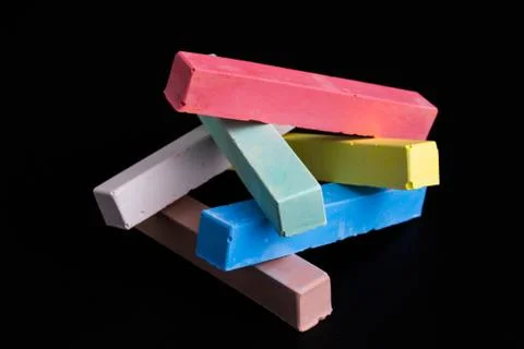 Colored chalk on a blackboard background Stock-Fotos