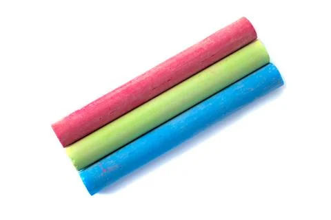 Colored chalks on white background with soft shadows Stock-Fotos