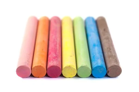 Colored chalks on white background with soft shadows Stock-Fotos