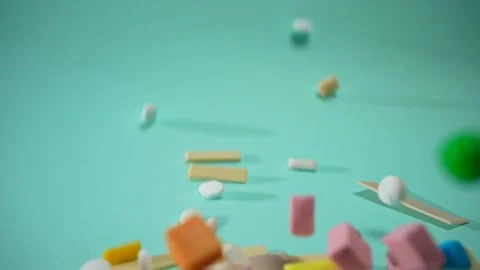 Colored chewing gum and refreshing candy drop on blue background,nobody Stock Footage 224352001