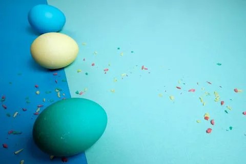 Colored chicken eggs. Easter holiday. Abstraction. Place for text Foto stock