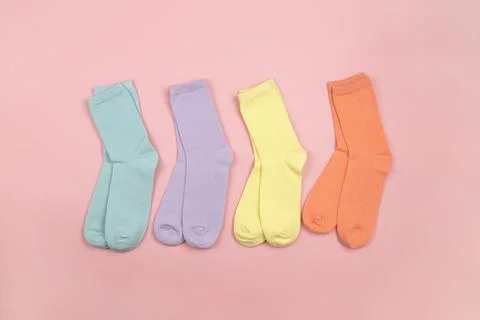 Colored children's socks without a pattern, pink, lilac, yellow, orange on a Foto stock