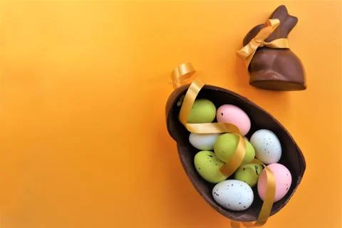 Colored chocolate Easter eggs and chocolate bunny 스톡 사진