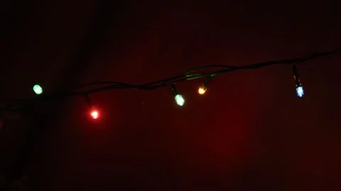 Colored Christmas lights blinking slowly Stock Footage 302545172