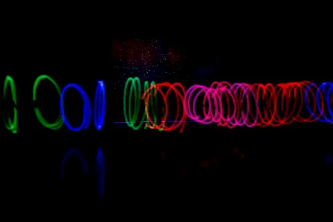 Colored circles in the dark Stock Photos