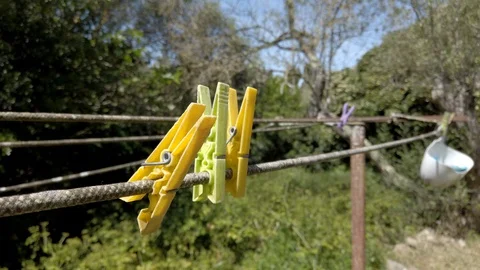 Colored clothes pegs Stock Footage 129649018