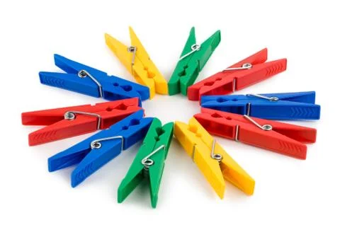 Colored clothespins isolated Stock Photos