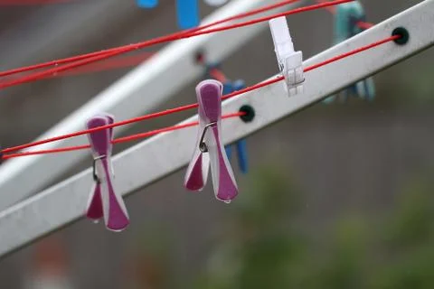 Colored clothespins Stock Photos