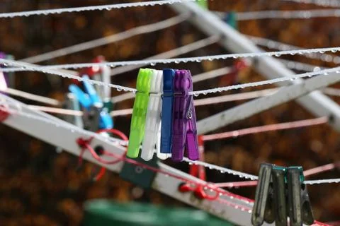 Colored clothespins Stock Photos