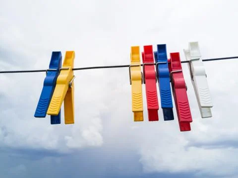 Colored clothespins Stock Photos