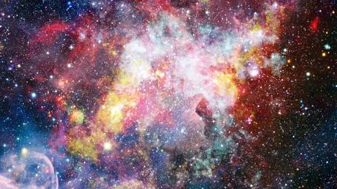Colored clouds in nebula. Elements of this image furnished by NASA. Stock Photos