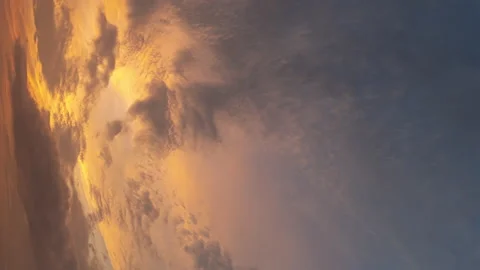 Colored clouds at sunrise time, side turned picture Stock Footage 160342719